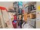 Well-organized storage closet with multiple shelves filled with boxes and bins at 6617 Nautical Dr, Lakewood Ranch, FL 34202
