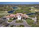Aerial view of the Legacy Golf Club clubhouse highlighting the surrounding golf course and community at 7141 Whitemarsh Cir, Lakewood Ranch, FL 34202