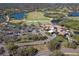 Legacy Golf Club aerial photo showcasing the golf course, mature trees, and residential communities at 7141 Whitemarsh Cir, Lakewood Ranch, FL 34202
