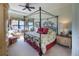 Inviting main bedroom with decorative furnishings, large windows, and a comfortable sitting area at 7141 Whitemarsh Cir, Lakewood Ranch, FL 34202