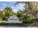 Landscaping surrounding the Whitemarsh neighborhood entrance sign, set against a backdrop of trees at 7141 Whitemarsh Cir, Lakewood Ranch, FL 34202