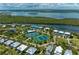 Stunning aerial view of the community highlighting its prime waterfront location and amenities at 7490 Palm Island Dr # 2324, Placida, FL 33946
