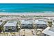Stunning aerial view of beachfront homes with Gulf views and white sandy beach access at 7490 Palm Island Dr # 2324, Placida, FL 33946
