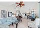Spacious living room with vaulted ceiling, fan and comfortable seating at 7490 Palm Island Dr # 2324, Placida, FL 33946