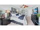 Charming main bedroom featuring stylish decor, a comfortable bed, and a partial ocean view at 7490 Palm Island Dr # 2324, Placida, FL 33946