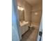 Bright bathroom features a vanity sink and tiled shower-tub combo at 8323 Eagle Isle Pl, Bradenton, FL 34212