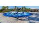 Community splash pad with colorful play structures, perfect for Gathering fun in the sun at 8619 Firefly Pl, Parrish, FL 34219
