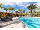 Inviting pool area featuring lounge chairs and cabanas for ultimate relaxation at 13604 Messina Loop # 203, Bradenton, FL 34211