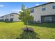 Well-maintained backyard lawn and landscaping at 15147 Sunny Day Dr, Bradenton, FL 34211