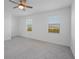 Spacious bedroom with neutral carpet, lots of natural light, and a serene atmosphere at 15147 Sunny Day Dr, Bradenton, FL 34211