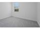 Bedroom boasts soft carpet, a window and electrical outlets along baseboard at 15147 Sunny Day Dr, Bradenton, FL 34211