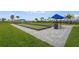 Well-maintained bocce ball courts with artificial turf and ample space for social and recreational activities for residents at 15147 Sunny Day Dr, Bradenton, FL 34211