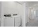 Convenient laundry room features modern washer and dryer at 15147 Sunny Day Dr, Bradenton, FL 34211