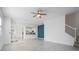 Open-concept living area featuring tile floors and a modern color palette, ideal for entertaining at 15147 Sunny Day Dr, Bradenton, FL 34211