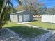 Shed in backyard with privacy fence at 1518 49Th E St, Palmetto, FL 34221