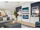 Cozy living room features a fireplace, TV, and stylish decor for a relaxing ambiance at 1604 Still River Dr, Venice, FL 34293