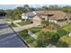Street view of the homes highlighting the well-maintained lawns, and landscaping at 1604 Still River Dr, Venice, FL 34293