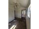 Bedroom with window, ceiling fan and carpet needing new finishes at 1666 23Rd St, Sarasota, FL 34234