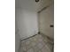 Image of a laundry room with hookups and tile flooring at 1666 23Rd St, Sarasota, FL 34234