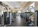 Spacious fitness center with a variety of weight machines and ample natural light at 181 Portofino Dr, North Venice, FL 34275