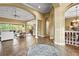 Spacious foyer showcases the open floor plan, with tile flooring, archways, and high ceilings throughout the home at 181 Portofino Dr, North Venice, FL 34275