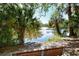 Relaxing view of the community pond from a shaded bench at 2130 Temple St, Sarasota, FL 34239