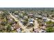 An aerial view showcases a residential neighborhood with lush greenery and well-spaced homes, offering a serene living environment at 2428 Linwood Dr, Sarasota, FL 34232