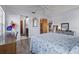 Bedroom featuring wood-look flooring and an open closet at 2428 Linwood Dr, Sarasota, FL 34232