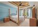 Spacious bedroom with tray ceiling, large windows, and a ceiling fan at 2515 130Th E Ave, Parrish, FL 34219
