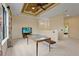 Bonus room with tray ceiling, a ceiling fan, and a small outdoor view at 2515 130Th E Ave, Parrish, FL 34219