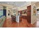 Gourmet kitchen with custom cabinets, granite countertops, and stainless steel appliances at 2515 130Th E Ave, Parrish, FL 34219