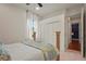 Main bedroom featuring neutral carpet, white walls, and a view of the yard at 2515 130Th E Ave, Parrish, FL 34219