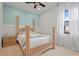 Brightly lit main bedroom with wooden trim, neutral walls and carpet at 2515 130Th E Ave, Parrish, FL 34219