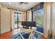 Home office with views of the pool area and a work space for two monitors at 2515 130Th E Ave, Parrish, FL 34219
