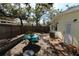 Relaxing wooden deck with outdoor furniture creating an ideal spot for enjoying peaceful moments at 2696 Loma Linda St, Sarasota, FL 34239