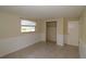 Neutral bedroom with a view and closet for storage at 2696 Loma Linda St, Sarasota, FL 34239