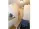 Cozy kitchen nook with bright natural light and view into a hallway with storage at 2696 Loma Linda St, Sarasota, FL 34239