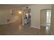 Open-concept living room showcasing tile floors and easy access to the kitchen at 2696 Loma Linda St, Sarasota, FL 34239