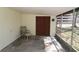 Enclosed patio with view to backyard at 2696 Loma Linda St, Sarasota, FL 34239