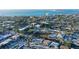 Aerial view of a waterfront home, surrounded by trees and close to the beach at 309 Avenida Milano, Sarasota, FL 34242