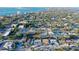 A home with canal access is circled in an aerial view of the surrounding neighborhood at 309 Avenida Milano, Sarasota, FL 34242