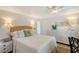 Bright bedroom with a ceiling fan and white walls at 309 Avenida Milano, Sarasota, FL 34242