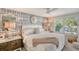 Bright bedroom with decorative wallpaper at 309 Avenida Milano, Sarasota, FL 34242