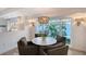 Charming dining area with stylish decor, bright lighting, and an inviting atmosphere at 309 Avenida Milano, Sarasota, FL 34242