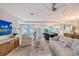 Inviting living room with bright decor, access to the backyard and connecting kitchen at 309 Avenida Milano, Sarasota, FL 34242