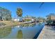 Picturesque waterfront property with a tranquil canal, docks and lush landscaping at 309 Avenida Milano, Sarasota, FL 34242