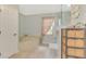 Bathroom featuring a corner tub, tiled floors, and separate glass enclosed shower at 3335 Brooklyn Ave, Port Charlotte, FL 33952