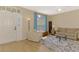 Inviting living room with natural light, neutral tones, and comfortable seating at 3335 Brooklyn Ave, Port Charlotte, FL 33952