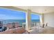 Spacious balcony with patio furniture and stunning ocean views at 35 Watergate Dr # 1101, Sarasota, FL 34236