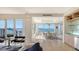 Bright dining area with water views, modern furnishings and stylish decor at 35 Watergate Dr # 1101, Sarasota, FL 34236
